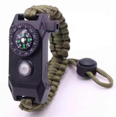 olive green paracord survival bracelet with built-in compass and LED light on white background