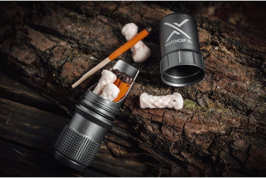 exotac matchcap xl waterproof match holder used for lighting fire outdoors