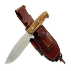 Knife with wooden handle and leather sheath on a white background