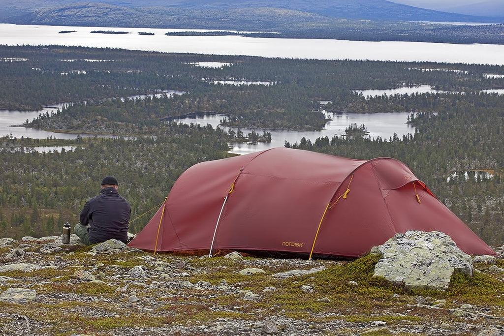 Nordisk OPPLAND 3 LW tunnel tent pitched in exposed outdoor terrain
