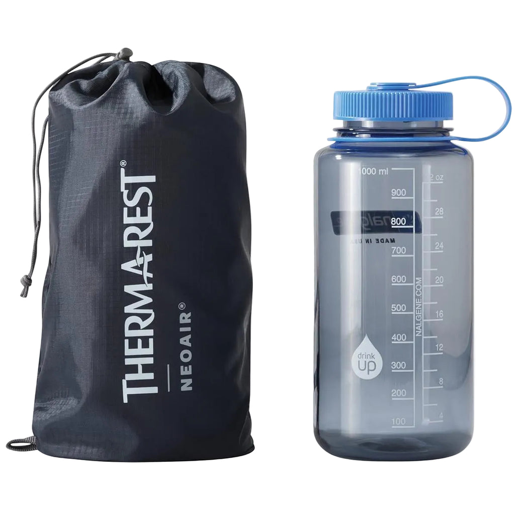 Therm-a-Rest NeoAir XTherm NXT sleeping mat packed size next to water bottle