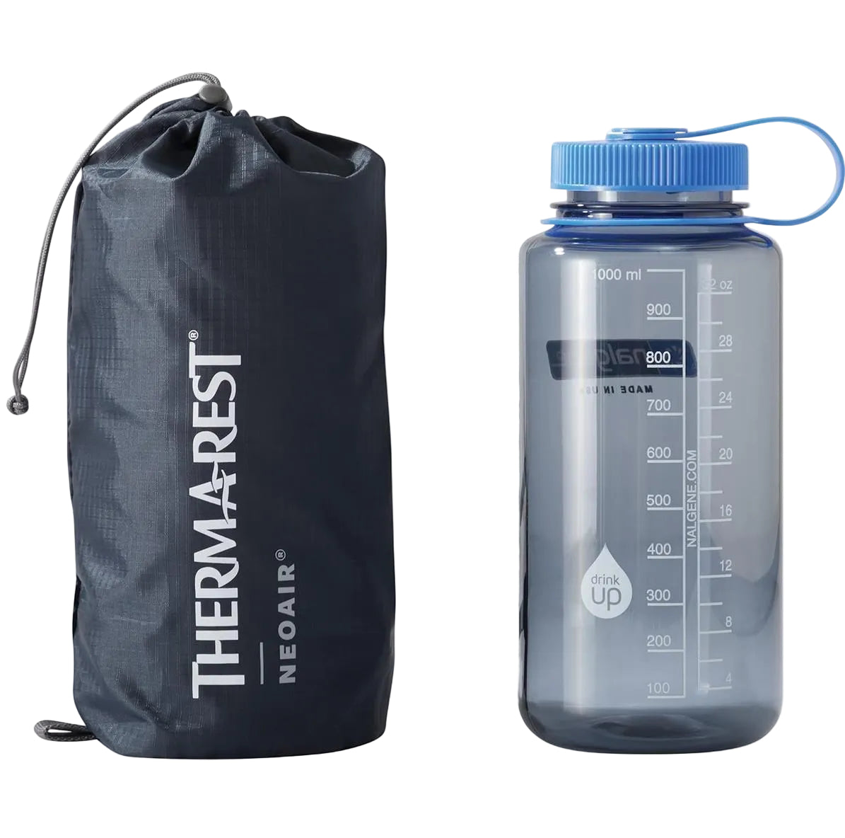 Packed Therm-a-Rest NeoAir XLite NXT sleeping pad with water bottle for size comparison