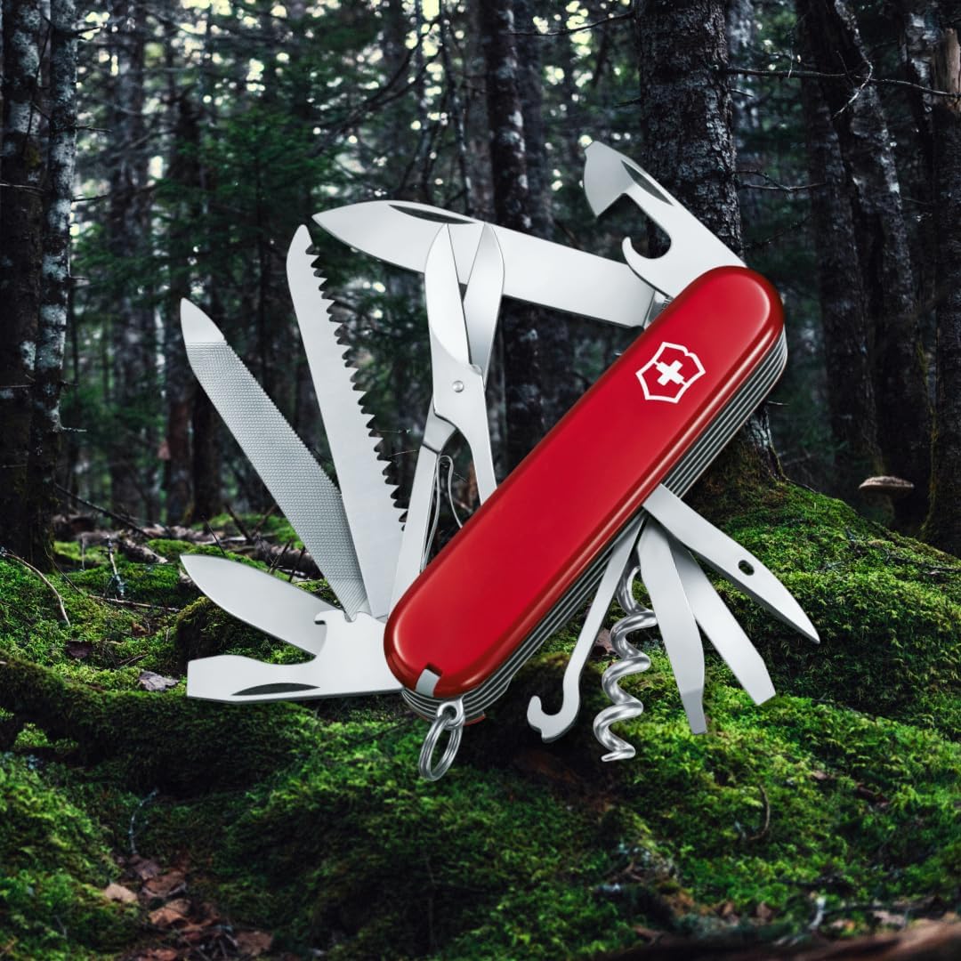 Victorinox Ranger multi tool knife open showing wood saw metal file and blade
